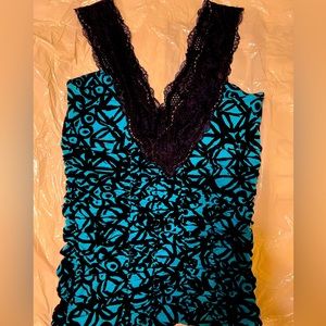Free People ladies turquoise top, sleeveless lace shoulder straps, Size medium